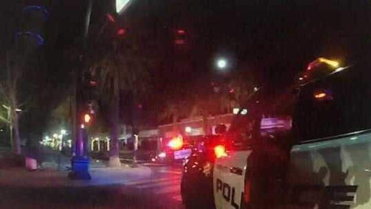 Police officers on Tuesday Feb. 22, 2022, investigate a hit-and-run that occurred at the intersection of Bridge and Plumas streets in Yuba City, California.