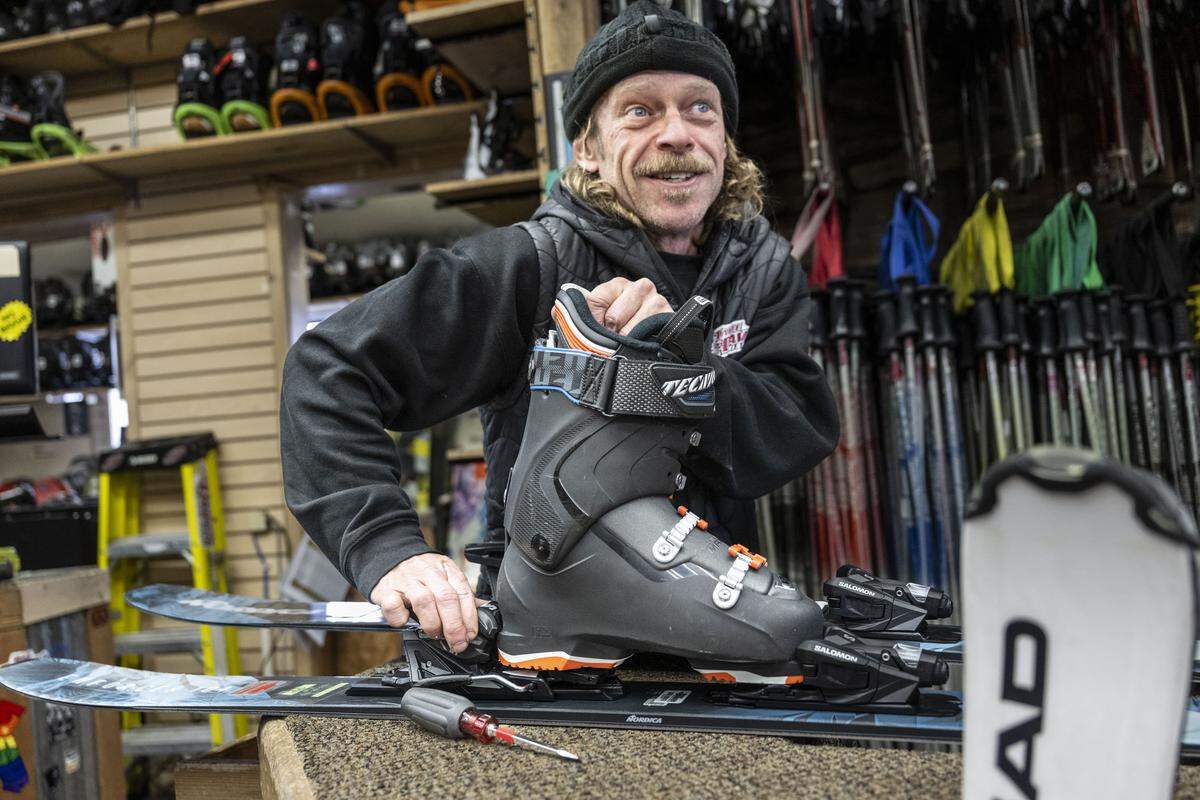 Kit Anderson, with Tahoe Dave’s Skis and Boards, prepares a set of skis in Truckee on Wednesday. Anderson, who has been living in the area for 25 years, said that his first reaction to the avalanche in was one of confusion and heartbreak. 