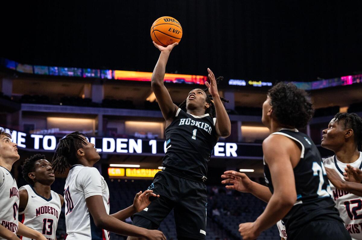 Sheldon Huskies’ Donovan Morgan (1) puts the ball in after other unsuccessful Huskies shots during the third period against Modesto Christian at the high school boys basketball Sac-Joaquin Section Division I championship game Saturday, Feb. 26, 2022, at Golden 1 Center in Sacramento. Modesto Christian beat Sheldon, 52-42, for the title.