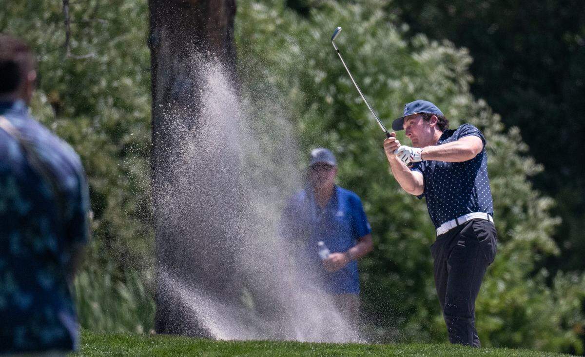 Actor Miles Teller swings at a ball in the sand during the final day of the American Century Championship celebrity golf tournament at Edgewood Tahoe Resort in Stateline, Nev., on Sunday, July 13, 2025.