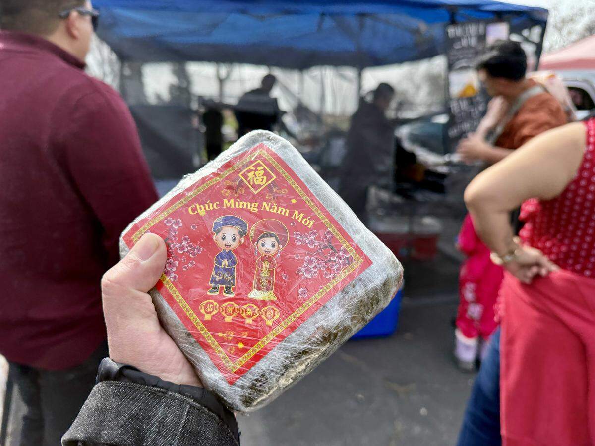Stockton-based Simon's Fusion sells banh cheung, a traditional Vietnamese dish of sticky rice and pork filling steamed in banana leaf at the Lunar New Year Tet Festival & Parade in Elk Grove on Saturday, Feb. 14.