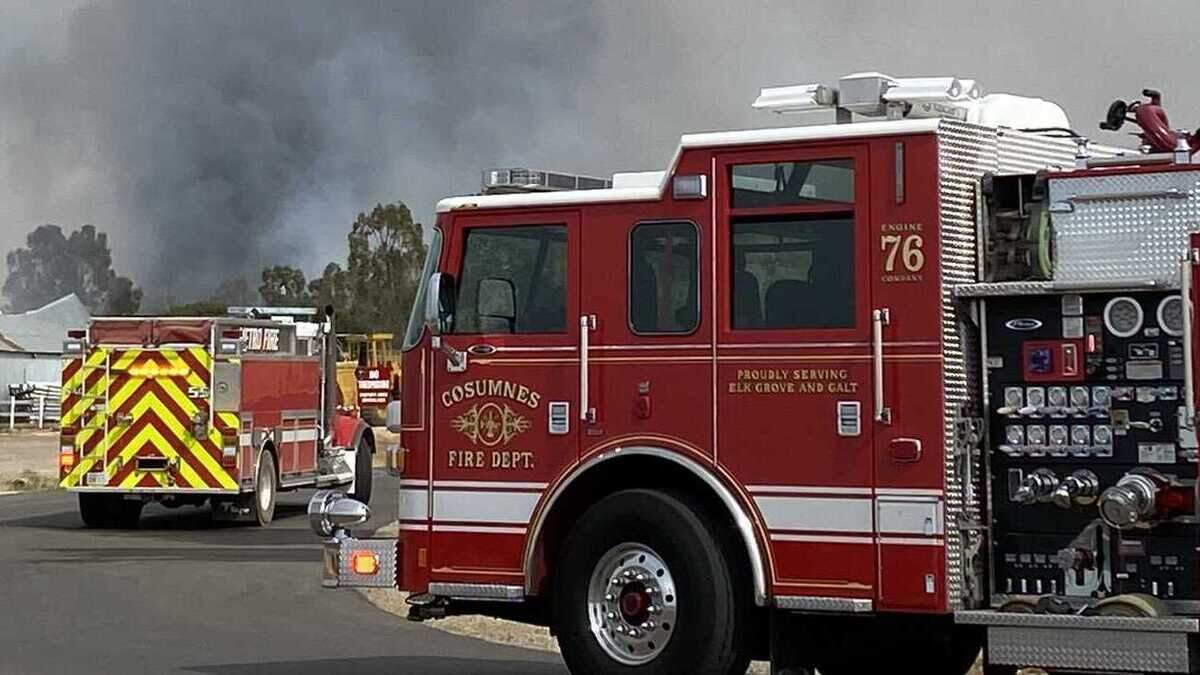 A two-alarm grass fire Wednesday June 16, 2021, was threatening structures, including homes, along Sheldon Road, between, Bradshaw and Waterman roads in Elk Grove, California.