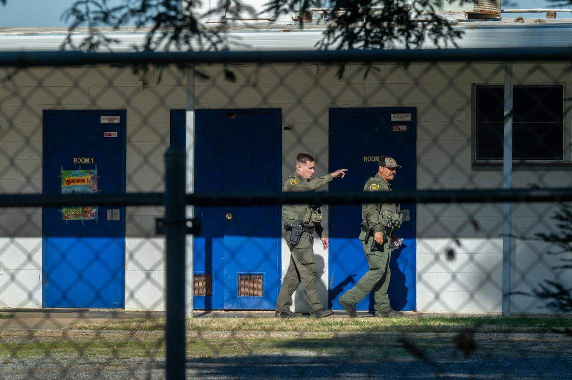 Police investigate at Feather River Adventist School in Oroville on Thursday, Dec. 5, 2024, the day after two kindergartners, boys 5 and 6 years old, suffered critical wounds in a shooting at the faith-based elementary school.