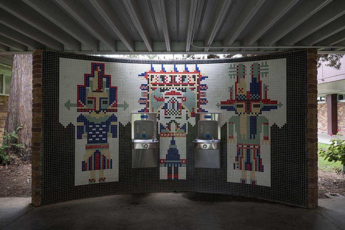 Tile murals, which date possibly to the school’s founding, decorate water fountains at Hiram Johnson High School in Sacramento on Tuesday. The school’s principal, Garrett Kirkland, worries that if the school has to change from its warrior mascot, that all depictions of Native Americans will have to be removed.