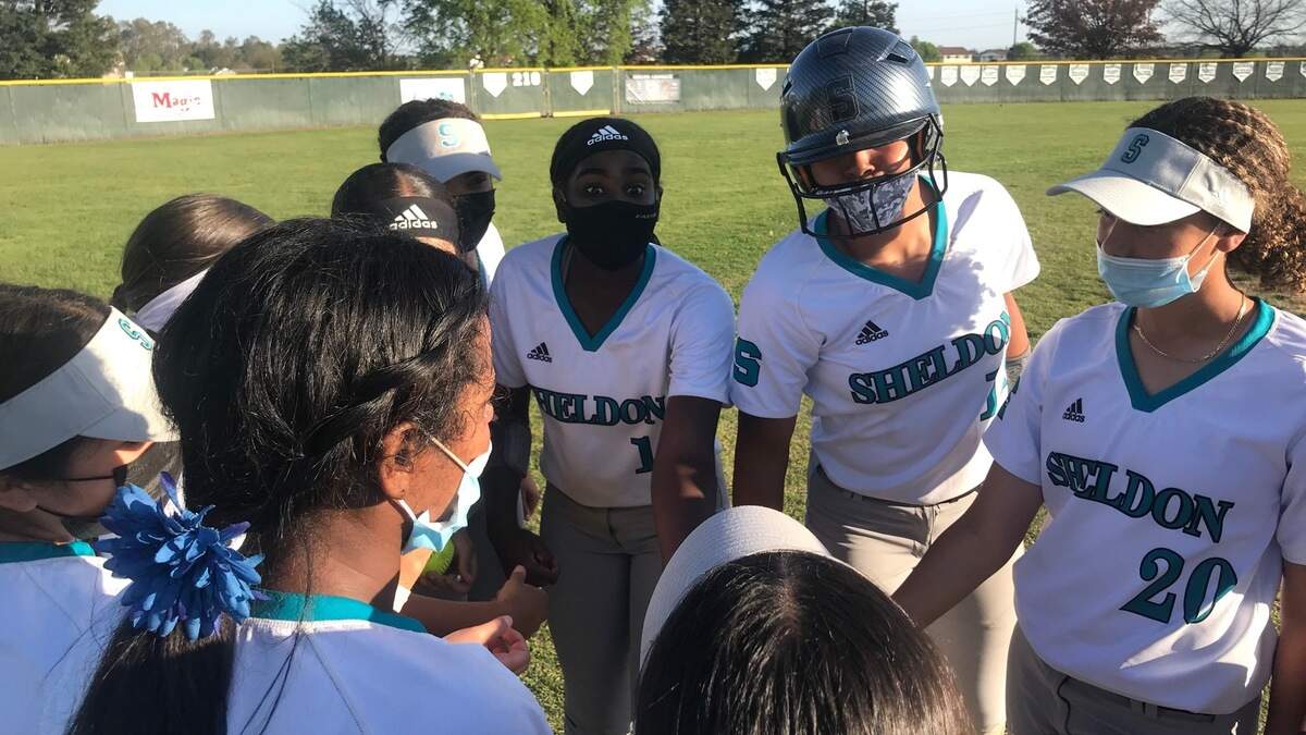 The Sheldon High School softball team huddles up after a 14-4 win over Pleasant Grove on Thursday, April 8, 2021.