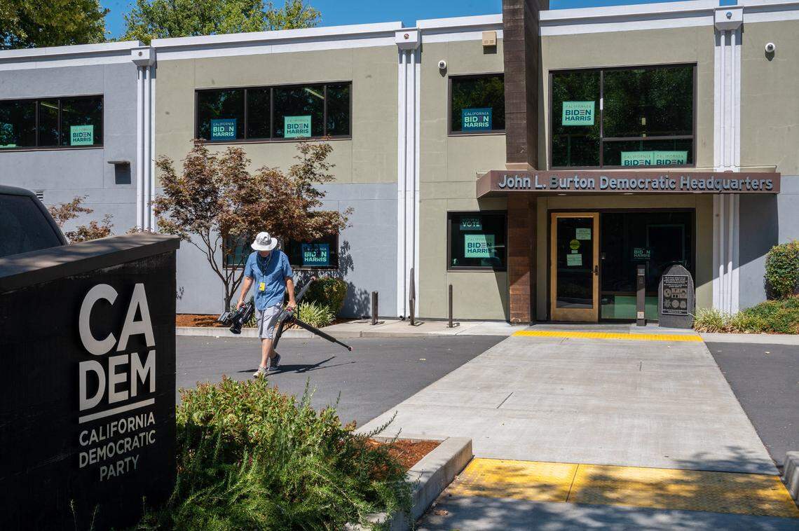 A TV cameraman visits the Democratic headquarters building in Sacramento on Friday, July 16, 2021, after two Bay Area men were indicted on charges of plotting to blow up the building because of their belief that former President Donald Trump won the 2020 election.