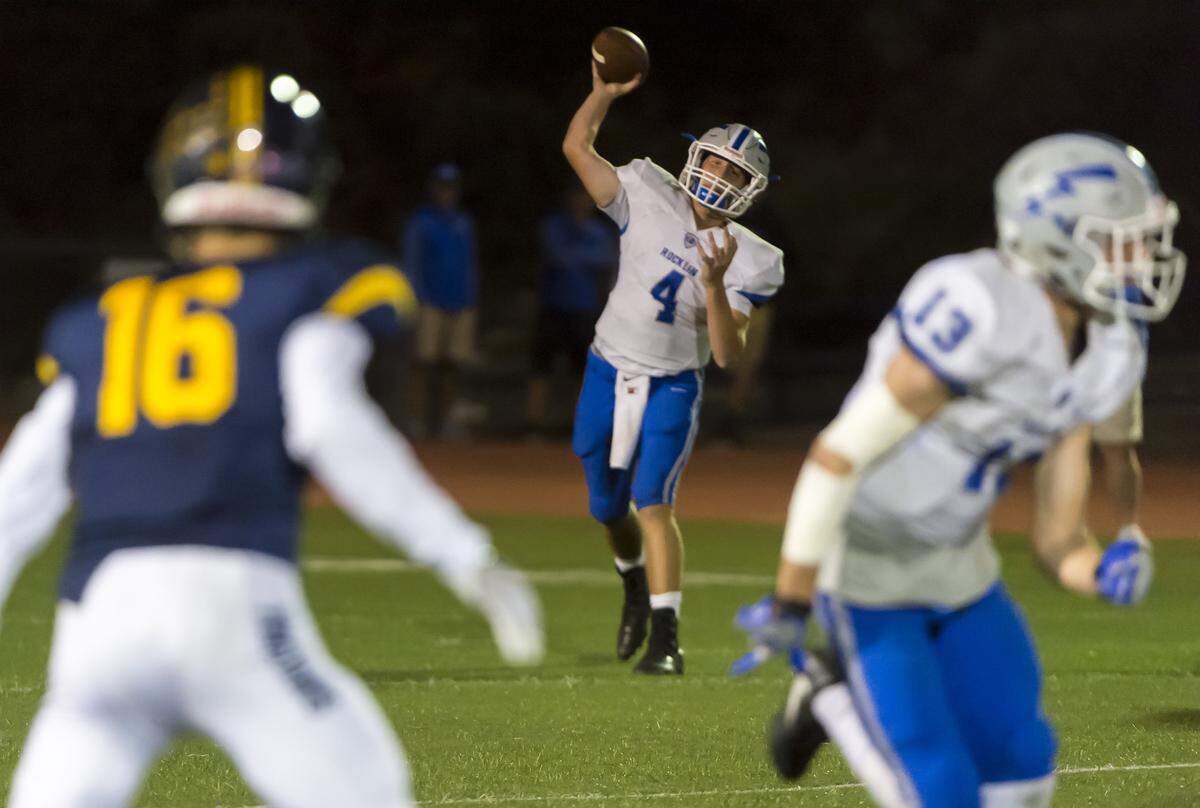 Rocklin’s Cade Wyant passes against Oak Ridge on Oct. 6, 2017.
