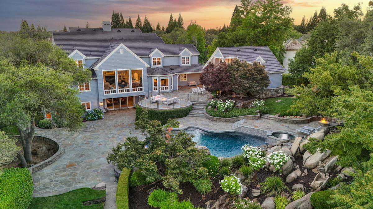 The backyard at 5940 Granite Glen Court is designed like a resort.