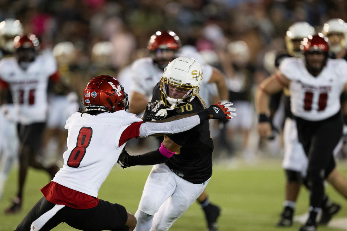 Sacramento State Hornets wide receiver Danny Scudero (10) is tackled by Eastern Washington Eagles cornerback Darrien Sampson (8) in the first half on Saturday at Hornet Stadium.