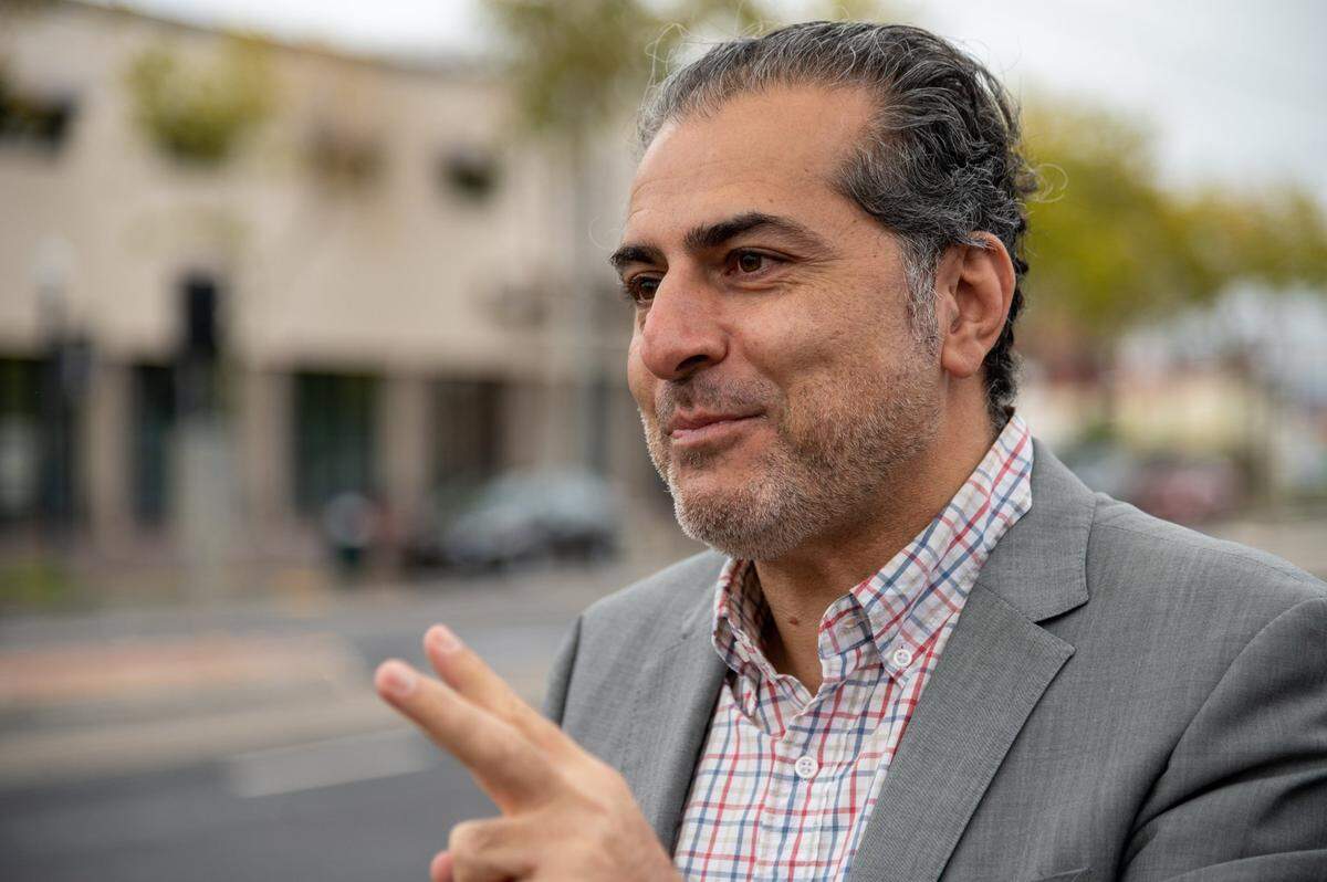 Sacramento City Councilman Sean Loloee speaks about the business climate on Del Paso Boulevard in North Sacramento in November.