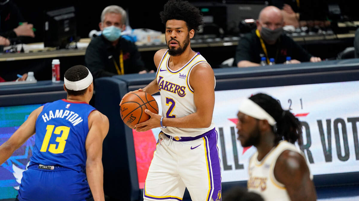 Los Angeles Lakers guard Quinn Cook (2) in the second half of an NBA basketball game Sunday, Feb. 14, 2021, in Denver. The Nuggegts won 122-105. (AP Photo/David Zalubowski)