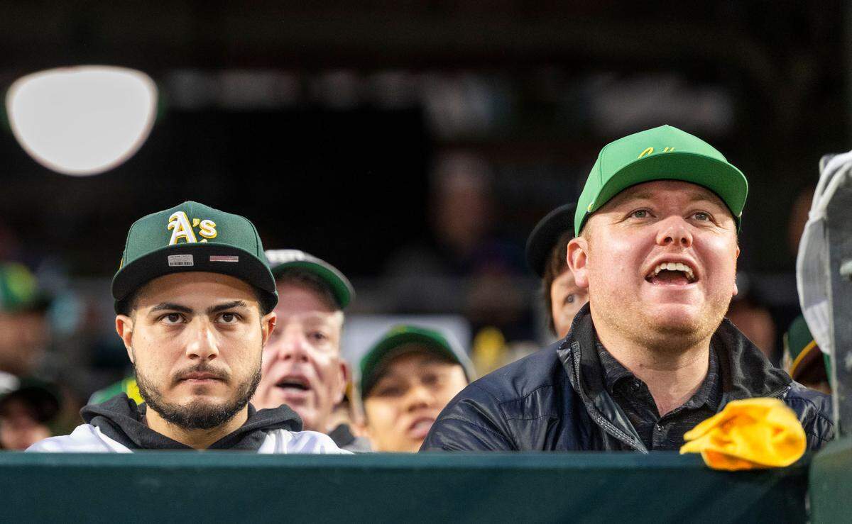 Fans watch their team play during the first Major League Baseball game at Sutter Health Park between the Athletics and Cubs in West Sacramento on Monday, March 31, 2025.