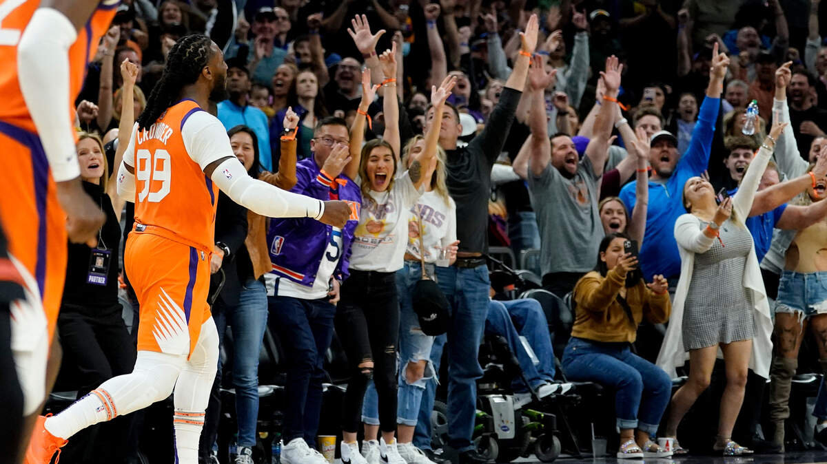 Phoenix Suns forward Jae Crowder (99) celebrates a three pointer against the New York Knicks during the second half of an NBA basketball game, Friday, March 4, 2022, in Phoenix. The Phoenix Suns defeated the Knicks 115-114. (AP Photo/Matt York)