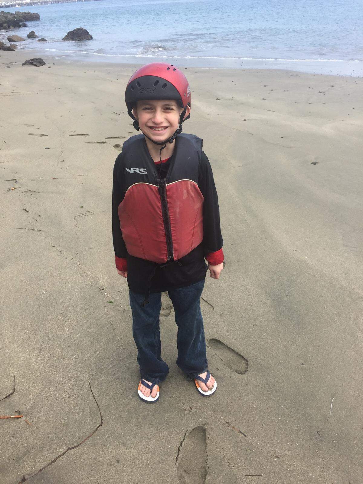 Wyland, pictured wearing a kayaking vest.