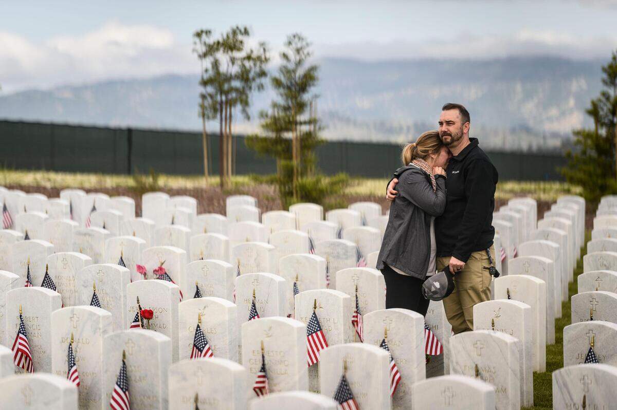 5. JP Williams, right, comforts wife Jordan Williams at the Sacramento Valley National Cemetery in Dixon on Memorial Day 2019. They came to pay respects to Jordan’s grandfather Antony Merlonghi. Merlonghi served as a pilot in the Air Force during the Korean and Vietnam wars and passed away in 2017. “I just want to thank him for everything because people like him we can live however we want to live, we are pretty blessed”.