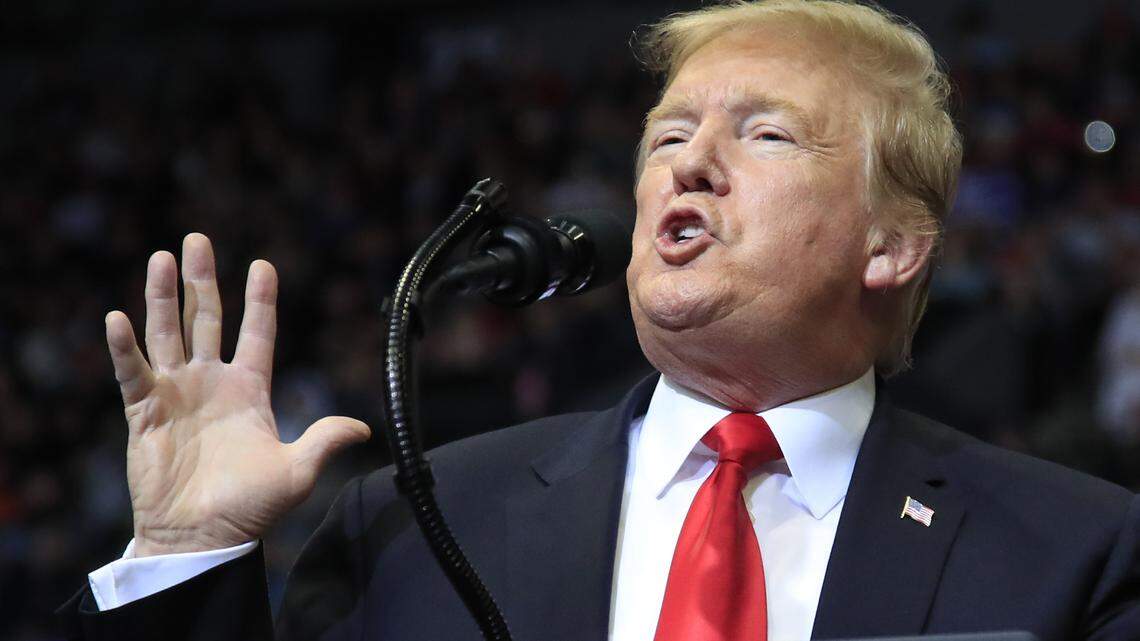 FILE - In this March 28, 2019 file photo, President Donald Trump speaks at a campaign rally in Grand Rapids, Mich. After losing in Congress, Trump is counting on the courts to kill off “Obamacare.” But some cases are going against him, and time is not on his side as he tries to score a big win for his re-election campaign. Two federal judges in Washington, D.C., this past week blocked Trump’s Medicaid work requirements and small business health plans. (AP Photo/Manuel Balce Ceneta, File)