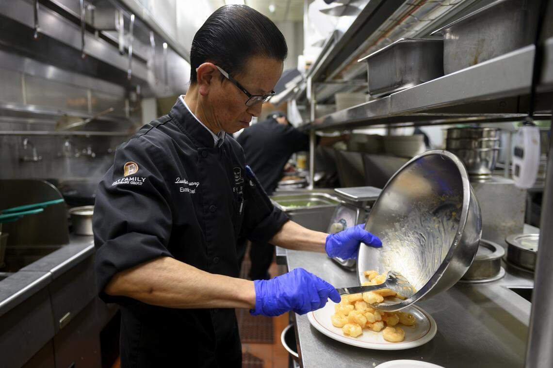 Chef Quentin Truong prepares Honey walnut shrimp, Fat’s Restaurant’s most popular dish, on Tuesday, May 21, 2019.