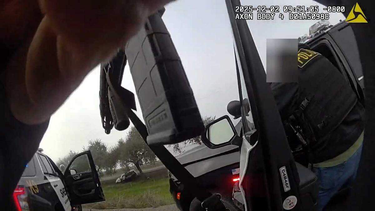 An image taken from body-worn camera video shows Sacramento County sheriff's deputies and other law enforcement personnel firing their weapons during a confrontation with former sheriff’s deputy Marvin Morales after a high-speed chase  along Interstate 5 on Dec. 2, 2025. Morales had run from authorities after he fatally stabbed his 11-year-old son in their Elk Grove home.