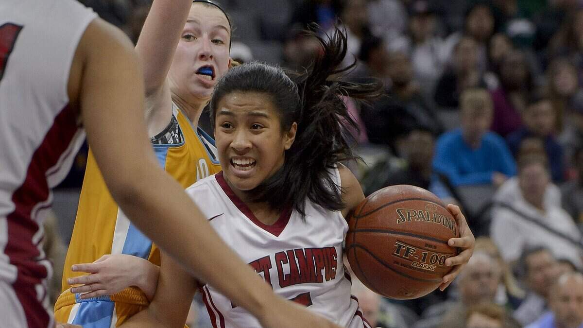 West Campus' Gabby Rones drives against Los Osos  during the Division IV state basketball championship game at Golden 1 Center in Sacramento on March 25, 2017.