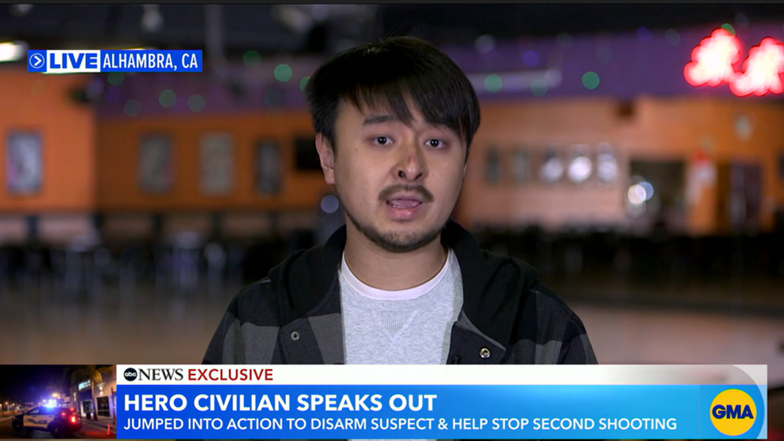 A man is being hailed a hero after prying a gun away from the Lunar New Year suspect at a Alhambra dance studio, media reports say.