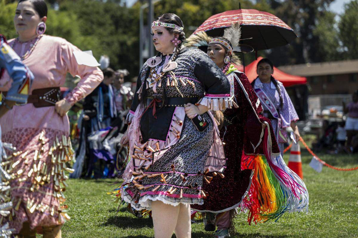 Sage Noelle Tellez Ortiz, a member of the Ione Band of Miwok Indians, participates in the 30th annual Sacramento Contest Powwow at O'Neil Park earlier this month. Tellez Ortiz said that dancing helps her cope with mental health and brings her closer to her community.