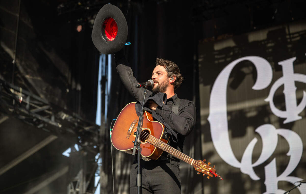 Singer-songwriter Chayce Beckham, the 2021 winner of “American Idol” from Apple Valley, Calif., waves his hat between songs at GoldenSky Country Music Festival at Discovery Park in Sacramento on Sunday, Oct. 20, 2024.