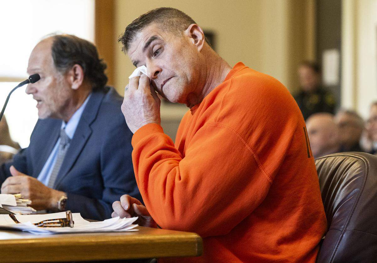 Former MLB pitcher Daniel Serafini, wipes away tears after he is sentenced for murdering his father-in-law Greg Spohr and shooting his mother-in-law Wendy Wood, in Placer Superior Court in Auburn in February. 