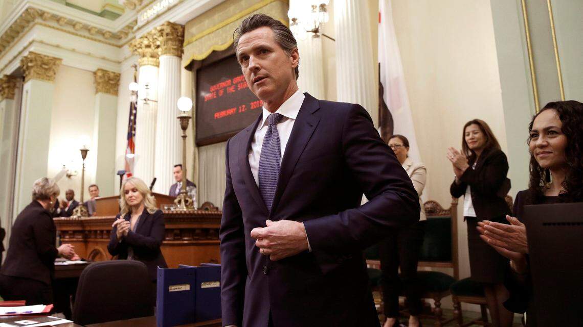 In this Tuesday, Feb. 12, 2019 photo, California Gov. Gavin Newsom receives applause after delivering his first state of the state address to a joint session of the legislature at the Capitol in Sacramento, Calif. Newsom said the state’s consumers should get a “data dividend” from technology companies, like Google and Facebook, who are make by capitalizing on the personal data they collect. (AP Photo/Rich Pedroncelli)