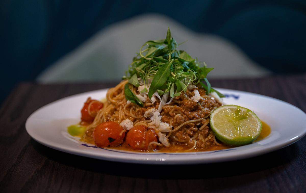 Chu Mai’s bun rieu capellini, with crab, pork, tomato and fresh herbs, is served earlier this month.