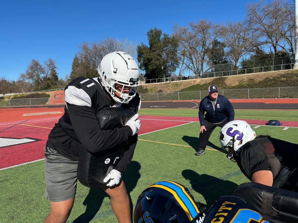 Aderian Adelabu practices Saturday, Jan. 11, 2025, at Cordova High School for the 65th Optimist All-Star Football Classic this Saturday at Granite Bay High School.