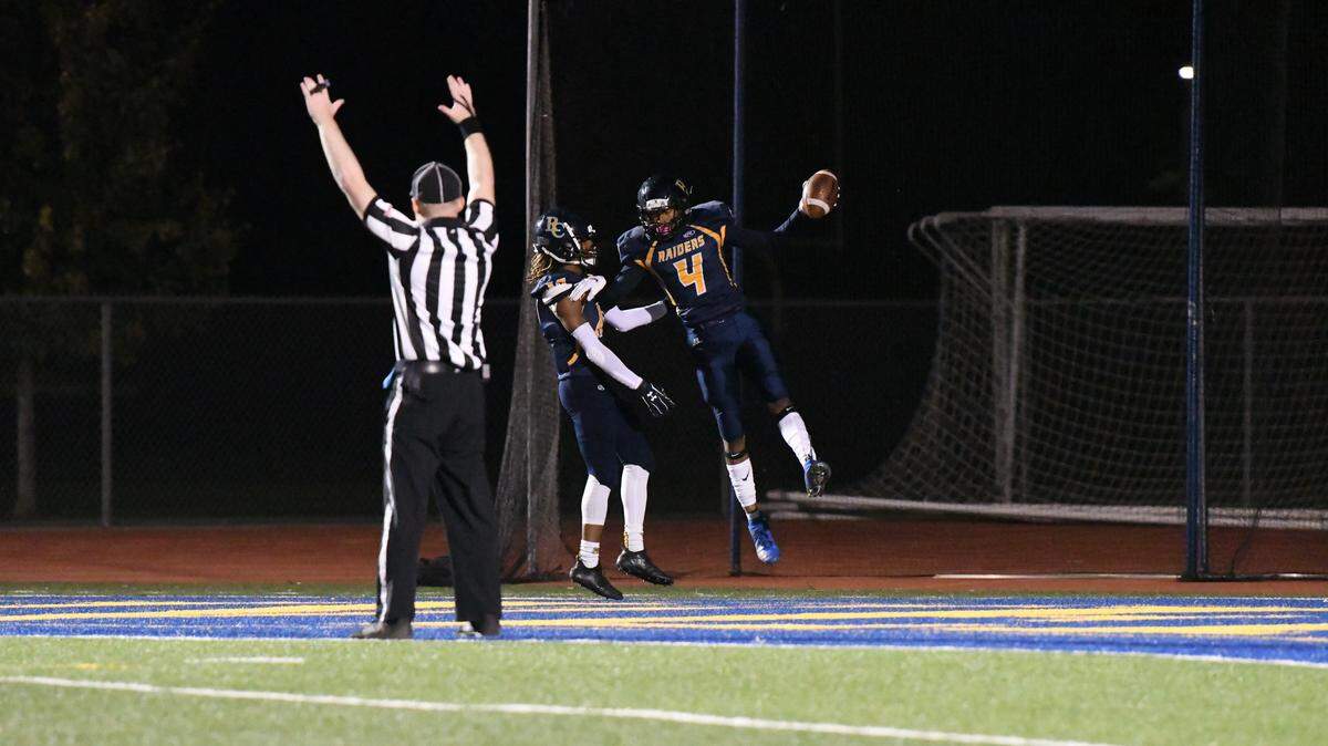 Amari Duncan celebrates his 52-yard rushing touchdown early in the first quarter against Burbank on Friday night during River City’s 21-16 win.