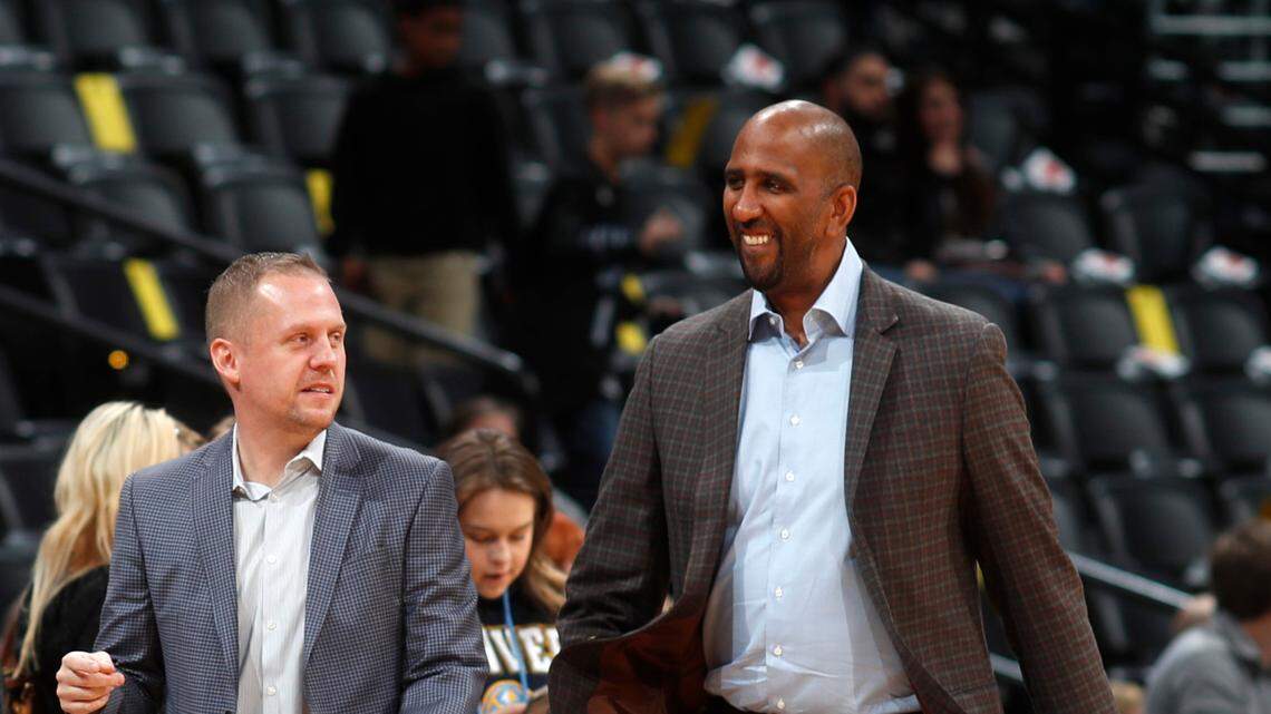 Denver Nuggets assistant general manager Calvin Booth, right, is being considered for the Sacramento Kings’ general manager position.