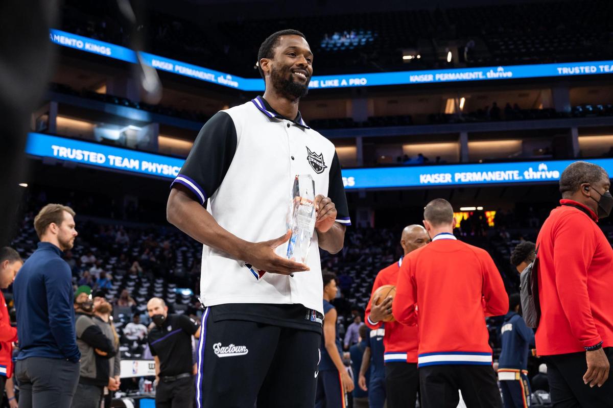 Sacramento Kings forward Harrison Barnes (40) holds the Oscar Robinson Triple-Double Award before his NBA basketball game against the New Orleans Pelicans on Tuesday, April 5, 2022, at Golden 1 Center in Sacramento. It was the last home game of the season for the Kings.