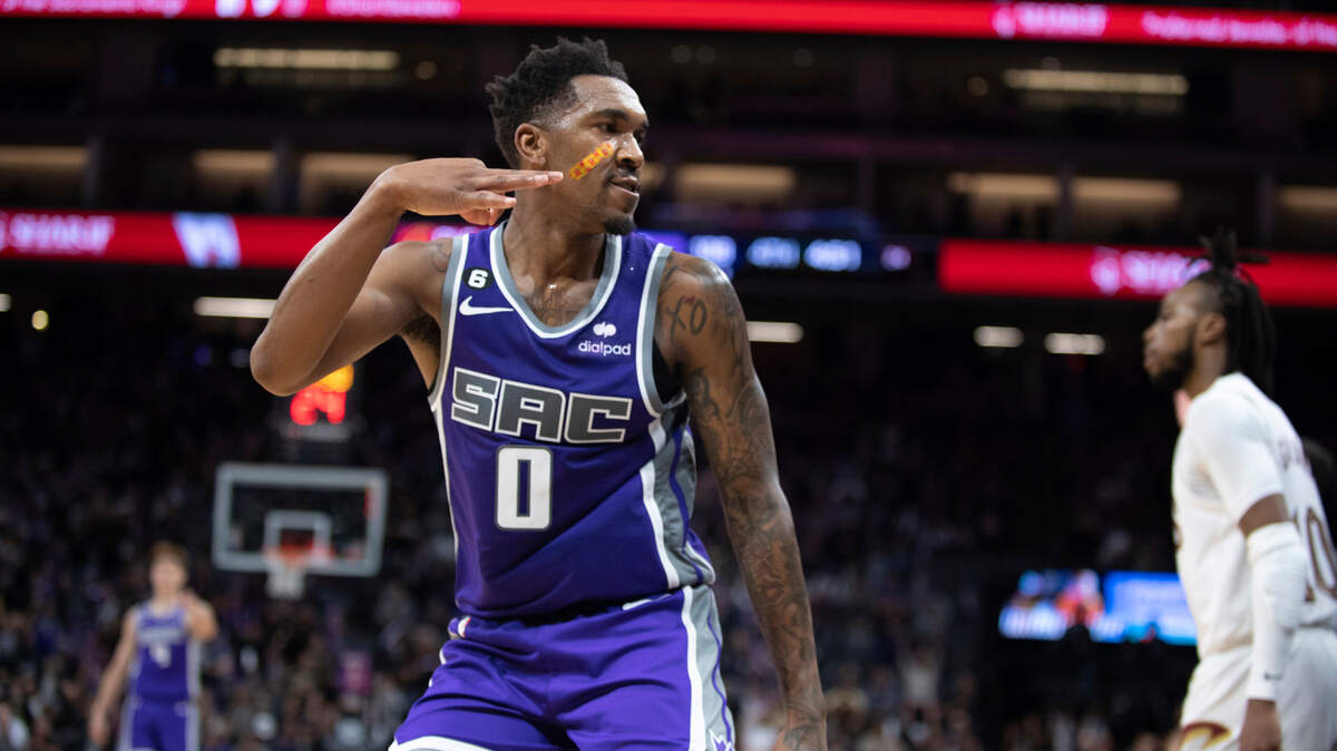 Sacramento Kings guard Malik Monk (0) signals after making a 3-point shot against the Cleveland Cavaliers during the second half of an NBA basketball game in Sacramento, Calif., Wednesday, Nov. 9, 2022. The Kings won 127-120. (AP Photo/José Luis Villegas)