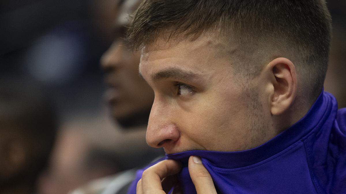 Sacramento Kings guard Bogdan Bogdanovic (8) watches the game from the bench in the second half during a game against the Oklahoma City Thunder at the Golden 1 Center on Wednesday, Jan 29, 2020 in Sacramento.