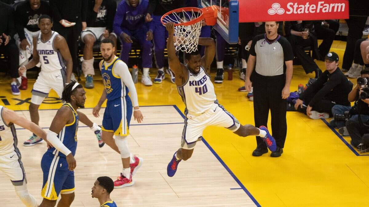 Sacramento Kings forward Harrison Barnes (40) dunks against the Golden State Warriors during Game 6 of the first-round playoff series at Chase Center on Friday.