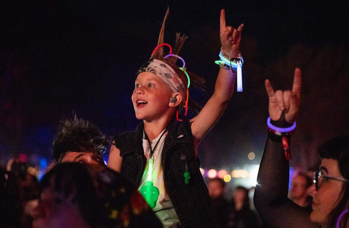 A child cheers on headliner Bring Me The Horizon during the Aftershock festival on Sunday, Oct. 5, 2025, in Sacramento’s Discovery Park.