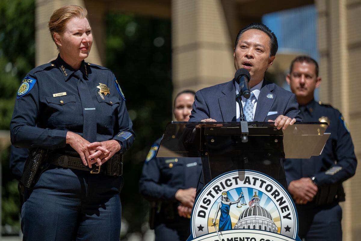 Sacramento County District Attorney Thien Ho, right, joined by Sacramento Police Chief Katherine Lester, speaks during a news conference at City Hall in downtown Sacramento on Wednesday about drug seizures and the arrests of at least 25 people during an operation targeting the city’s downtown drug trade.
