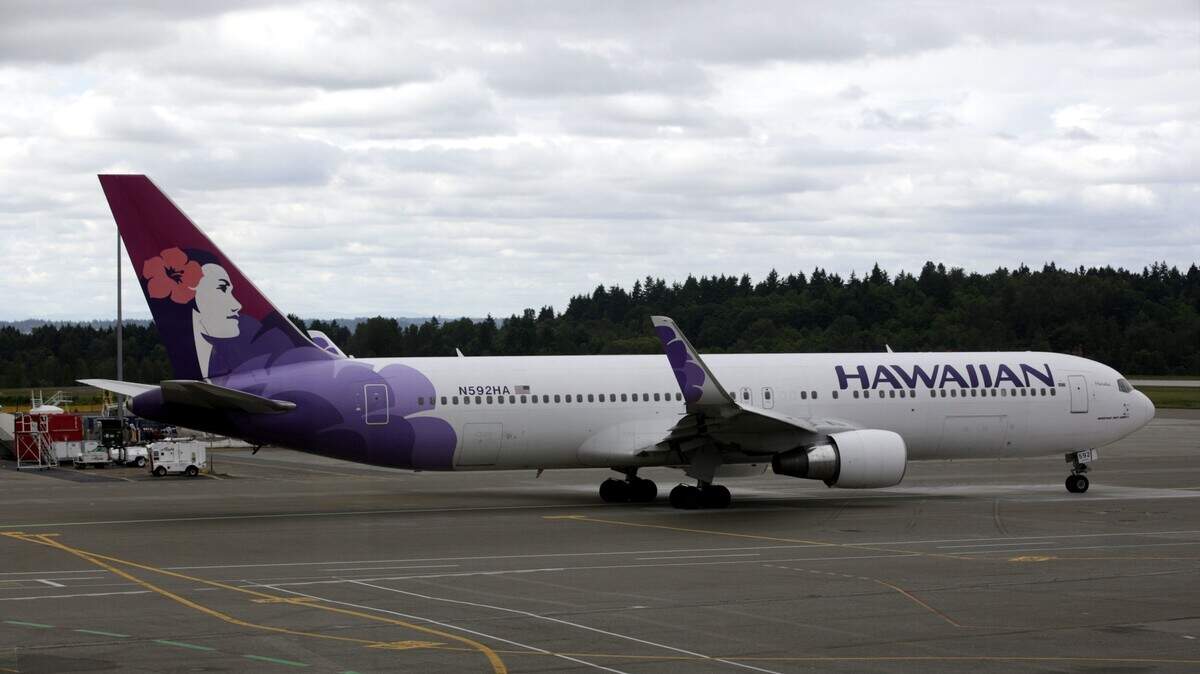 A Hawaiian Airlines flight from Oakland, California, to Maui on Friday was delayed by a mock crime scene photo sent by a teen to her mother. Later, someone accidentally discharged peppery spray aboard.