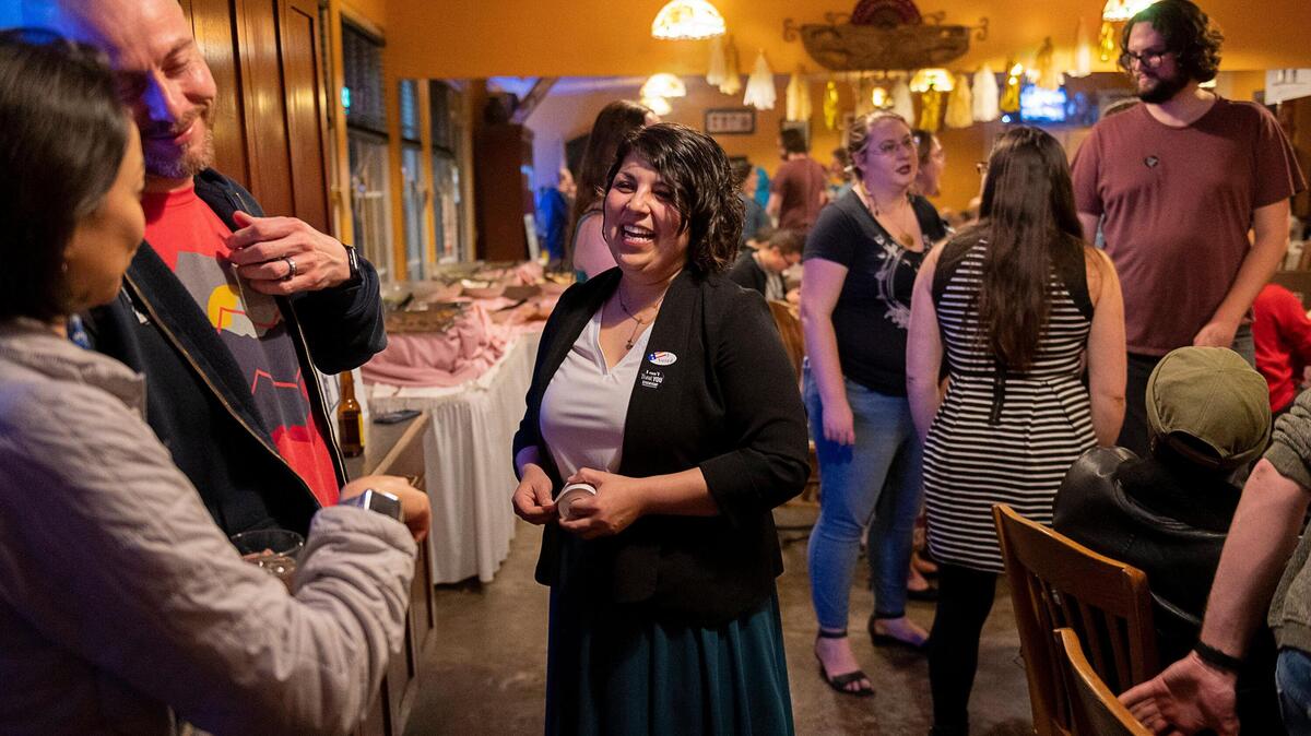 District 4 city council candidate Katie Valenzuela talks with supporters during her election night party at Vallejos on Tuesday, March 3, 2020 in Sacramento.