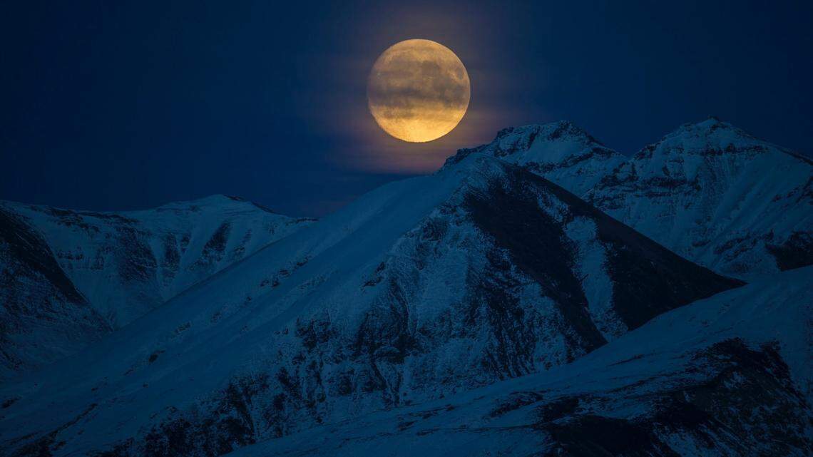 A snowmobiler stranded in dark Alaskan wilderness was saved by his iPhone’s emergency SOS feature, troopers said.