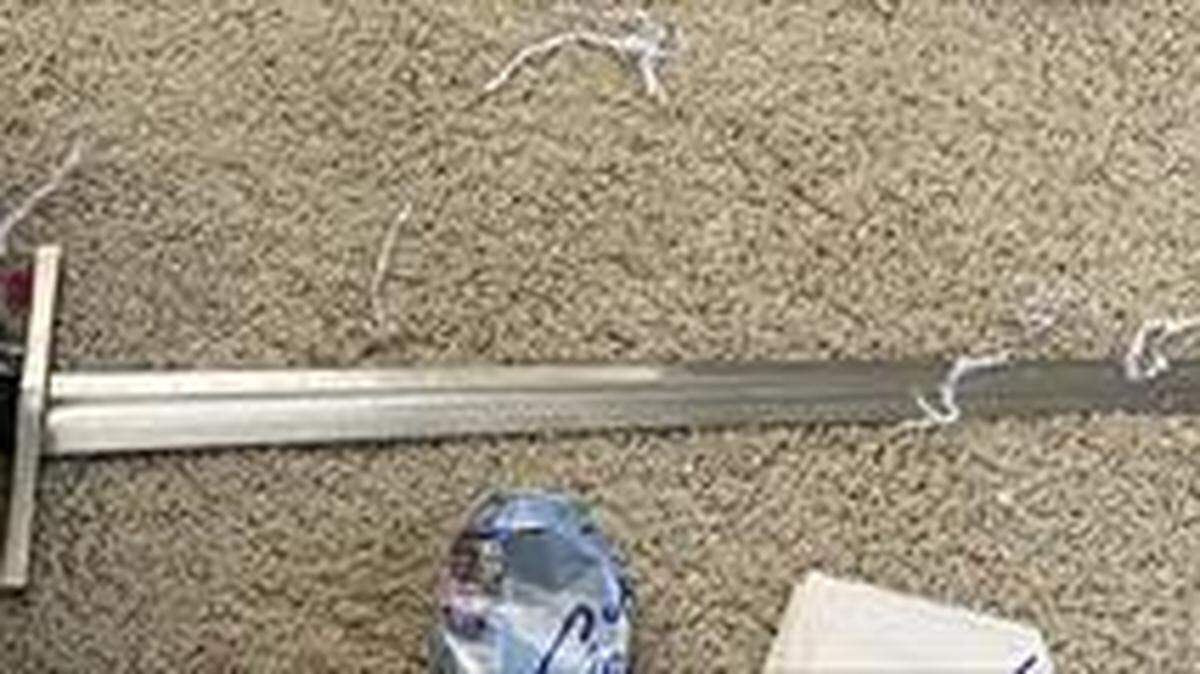A sword esd recovered from a Gateway West home on Aug. 10, 2022. A man used the sword to hold his wife and children hostage for hours inside the residence.