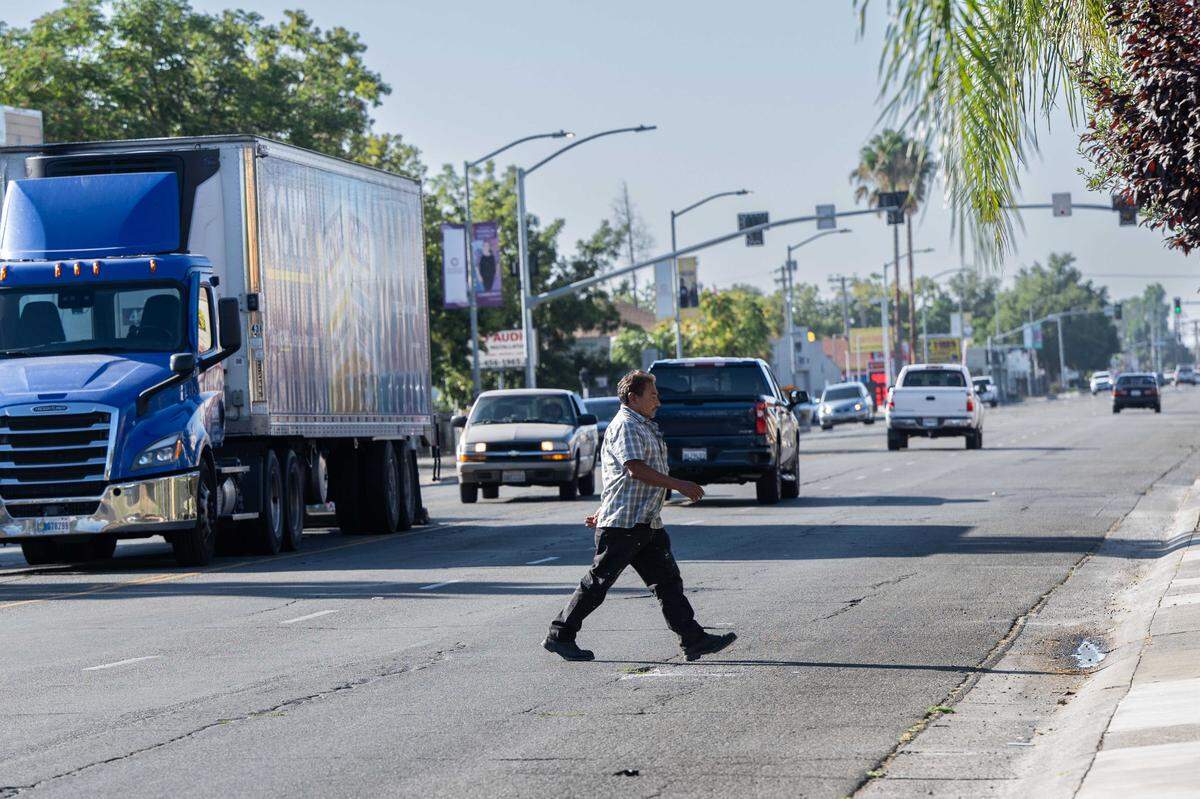 A pedestrian crosses Franklin Boulevard in Sacramento in 2023. Plans to add protected bike lanes, wider sidewalks and other safety upgrades in corridors like this often depend on securing highly competitive Active Transportation Program funding.