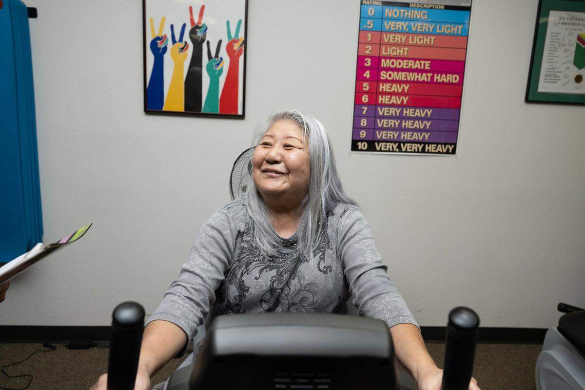 Hideko Yamada of Sacramento works out on a recumbent bike at the John A. Schafer, MD, Multiple Sclerosis Achievement Center on Nov. 14, in Citrus Heights. The center has a dream of a $15,000 to purchase an elliptical and recumbent bike to provide greater access to more members.