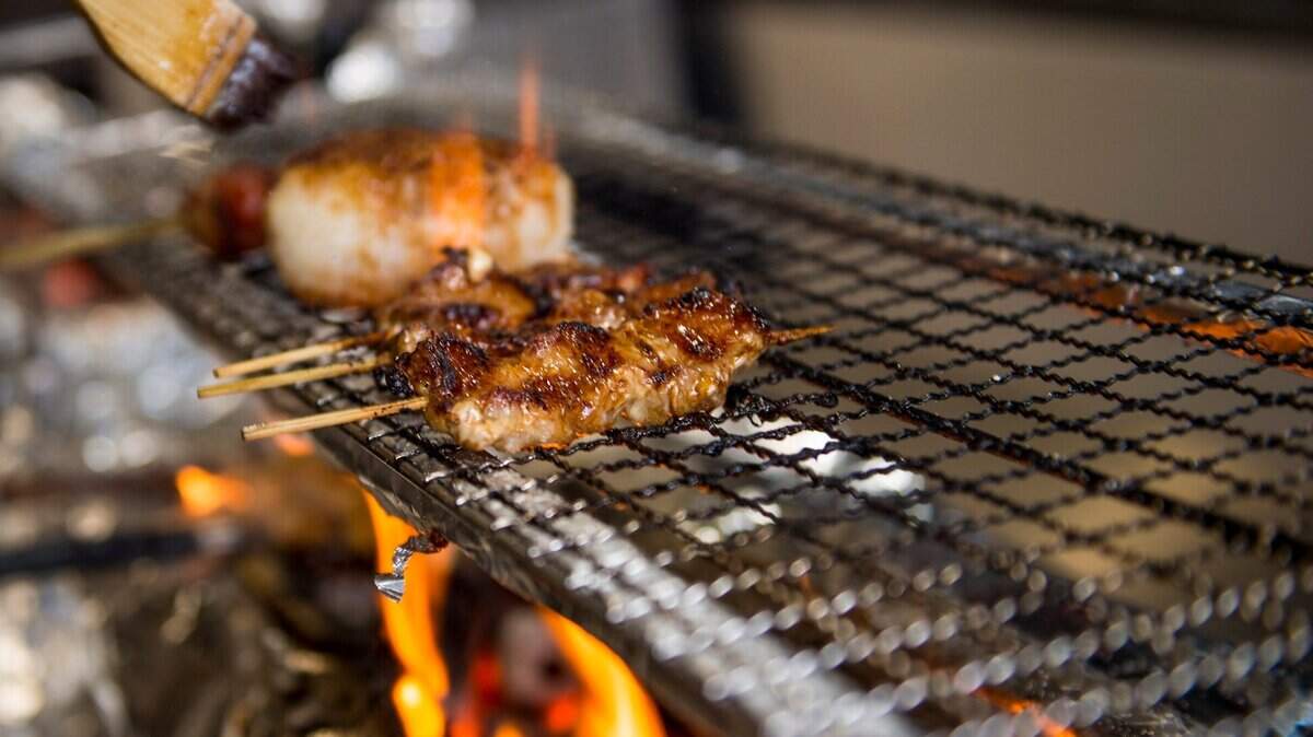 Grilled meat sits on the special Japanese grill known as Sumiyaki, which is imported from Japan at Japanese Izakaya restaurant Binchoyaki.