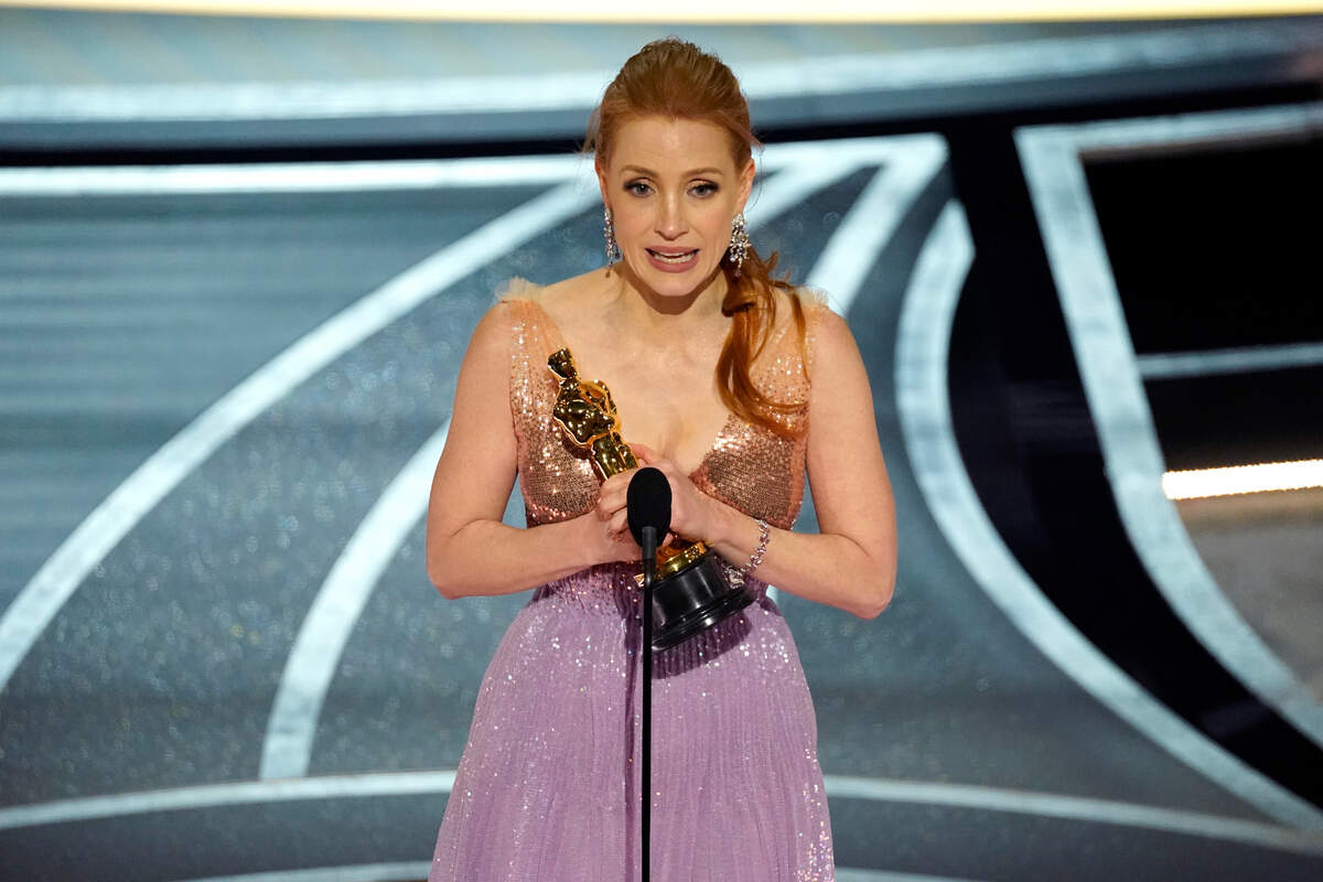 Jessica Chastain accepts the award for best performance by an actress in a leading role for “The Eyes of Tammy Faye” at the Oscars on Sunday, March 27, 2022, at the Dolby Theatre in Los Angeles.