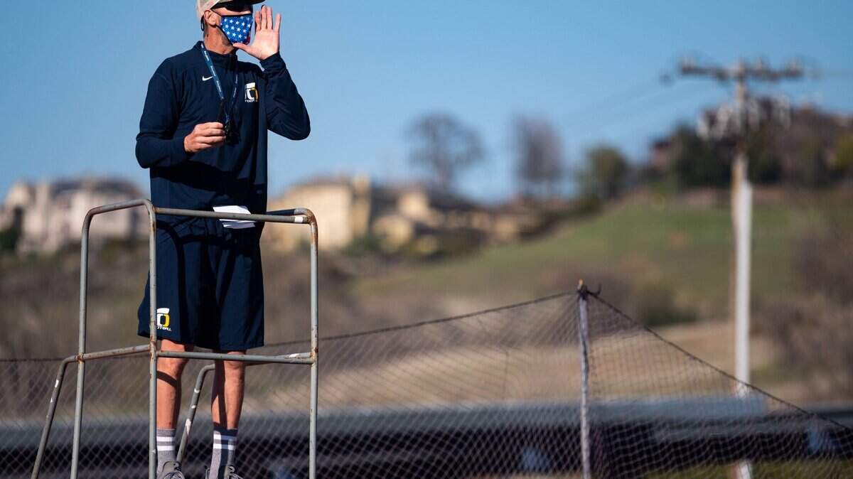 Oak Ridge High School football head coach Eric Cavaliere shouts directions during a team practice Thursday, March 4, 2021, on their home field in El Dorado Hills.