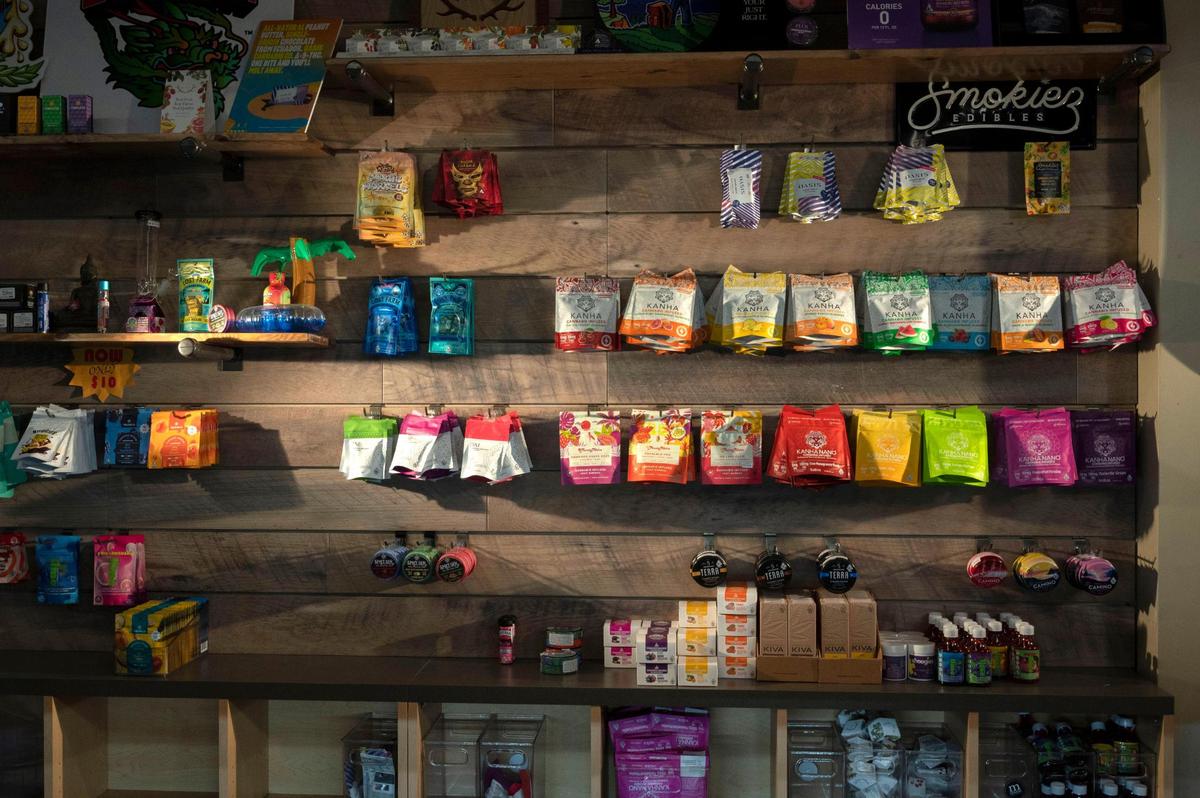 A vast array of cannabis-infused edibles are displayed at All About Wellness in midtown Sacramento on Tuesday.