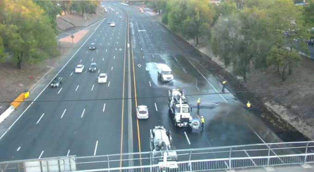 Caltrans crews removed water that flooded the southbound lanes of Highway 99 near 12th Avenue in Sacramento, California after a water main break Monday July 20, 2020.