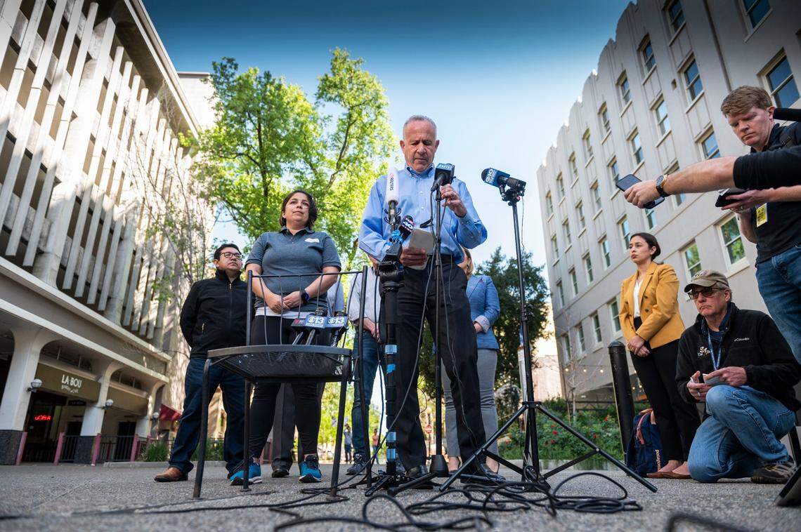 Sacramento Mayor Darrell Steinberg, flanked by members of the City Council, speaks about the mass shooting in downtown Sacramento on Sunday.